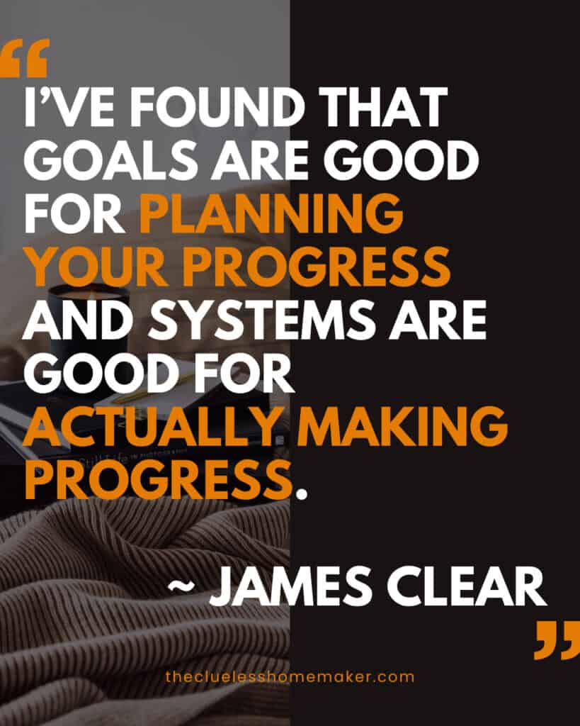 Quote by James Clear: 'I’ve found that goals are good for planning your progress and systems are good for actually making progress.' The text is bold, with 'planning your progress' and 'actually making progress' highlighted in warm orange. A cozy background features a blanket, a cup of coffee, and a book, with 'thecluelesshomemaker.com' at the bottom.